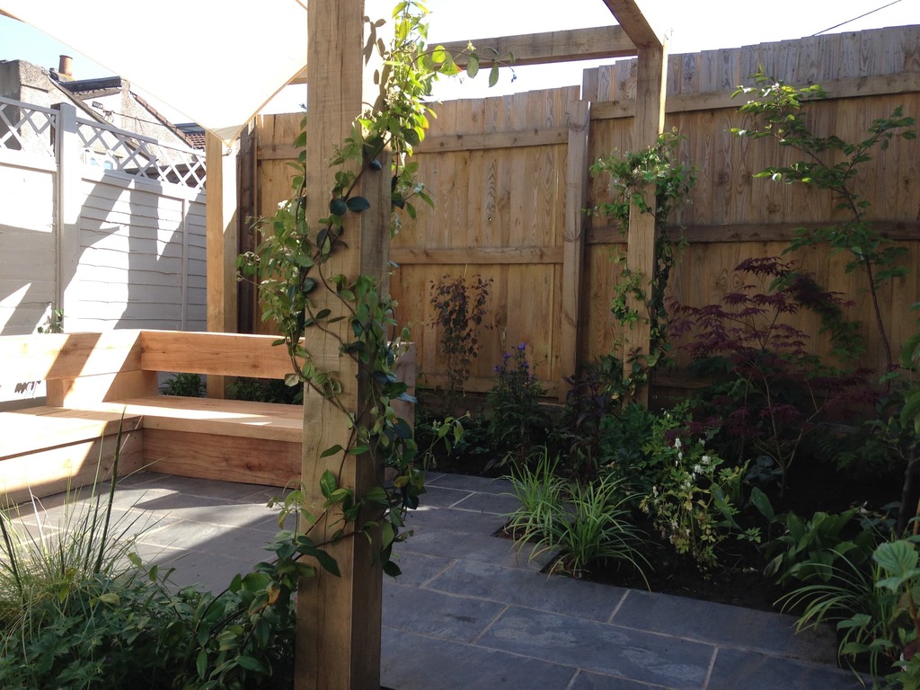 seating area in plant lover's garden in Bedminster Bristol