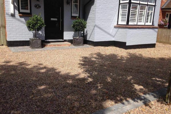 Front garden with gravel and bay standards